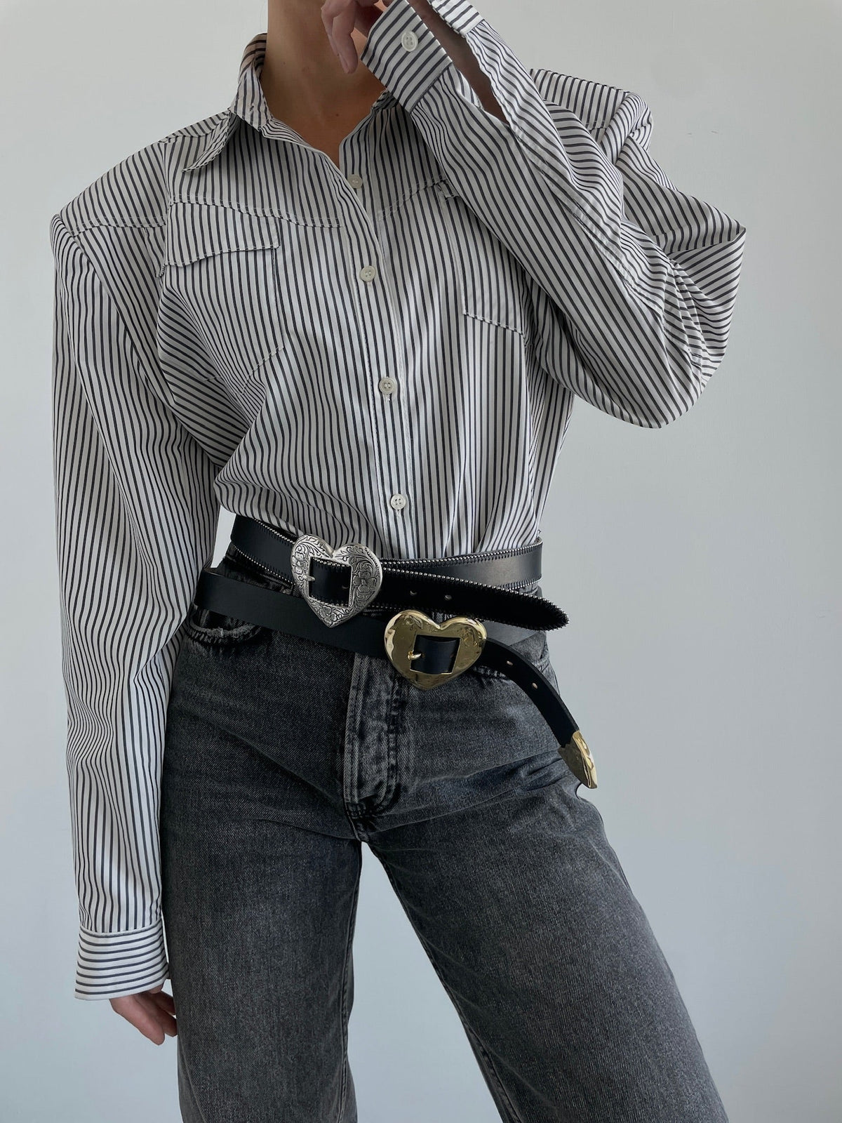 Brass Hammered Heart Belt in Black — worn detail