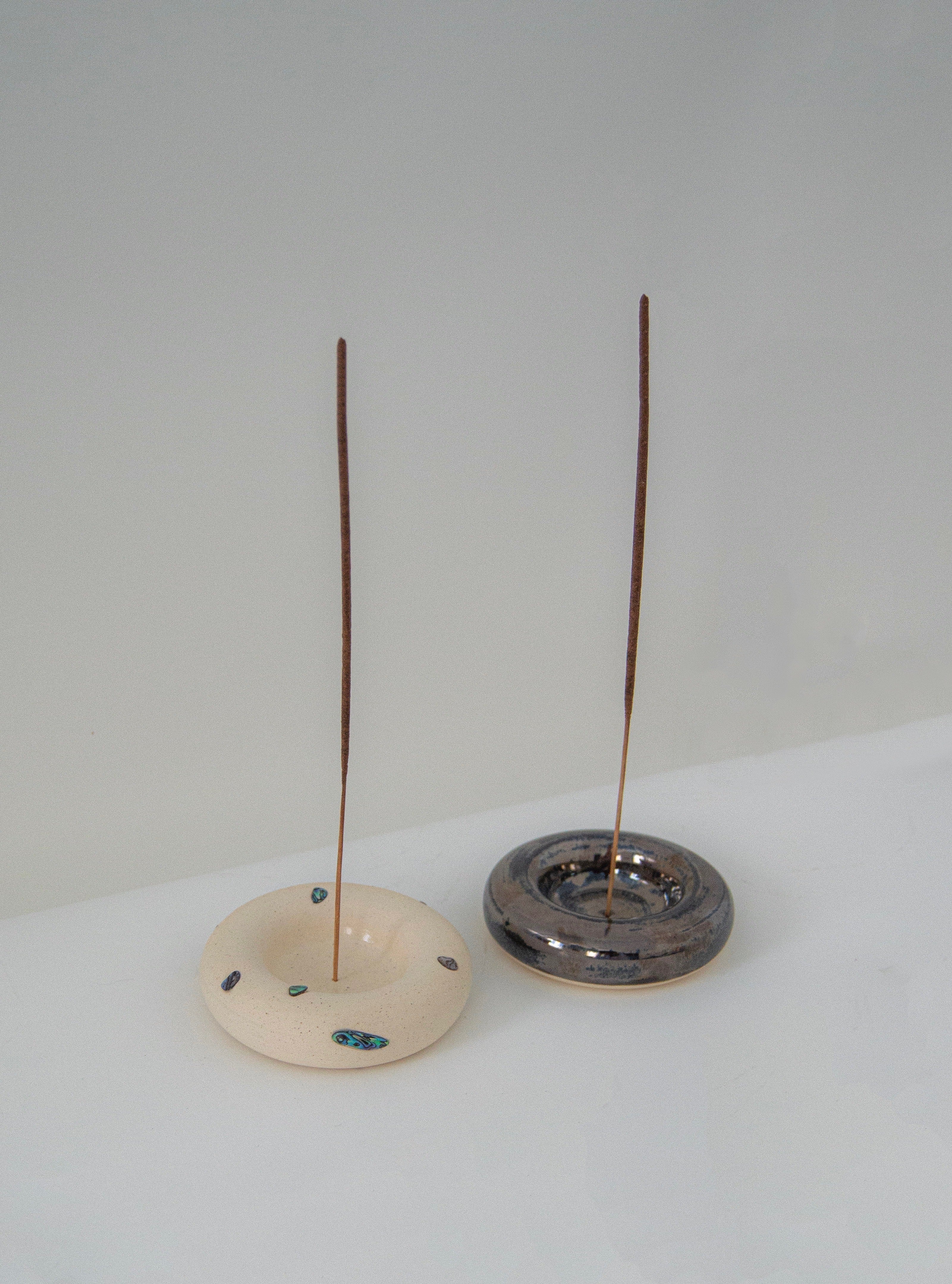 Incense Holder in Black Mirror — front view