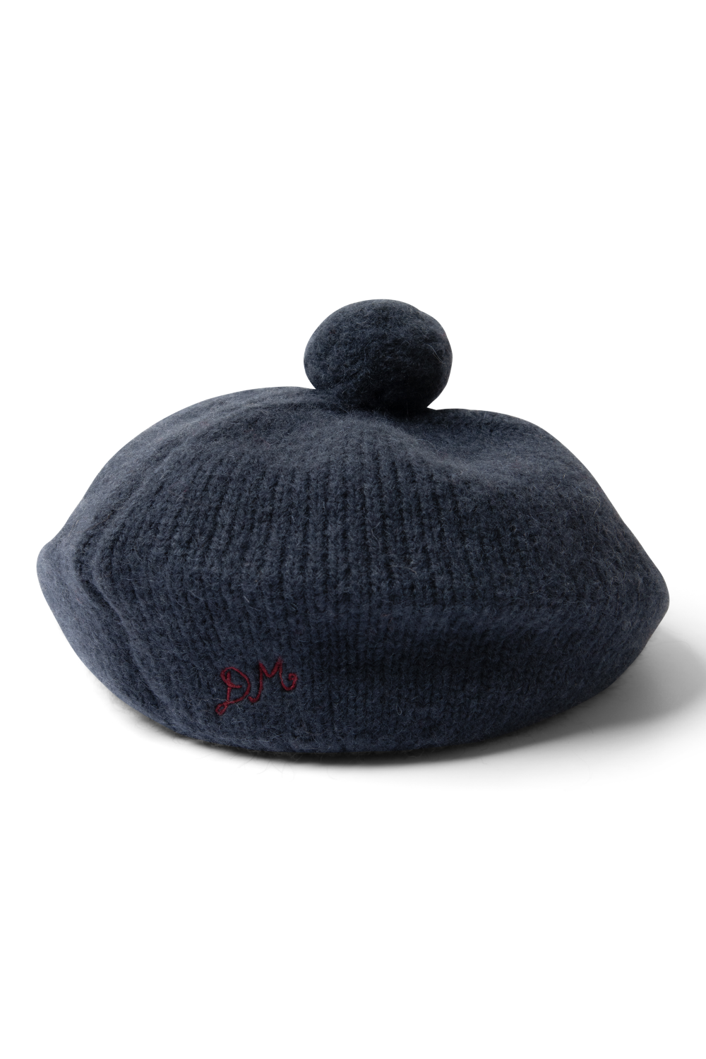 Knitted Pom Pom Beret in Navy, product view