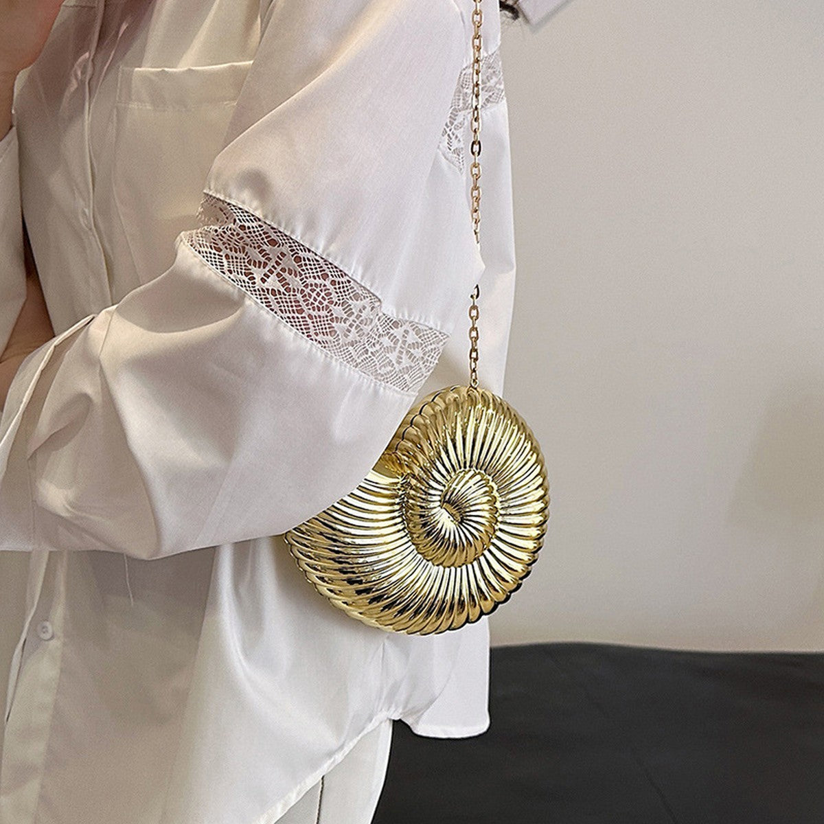Conch Clutch in Gold