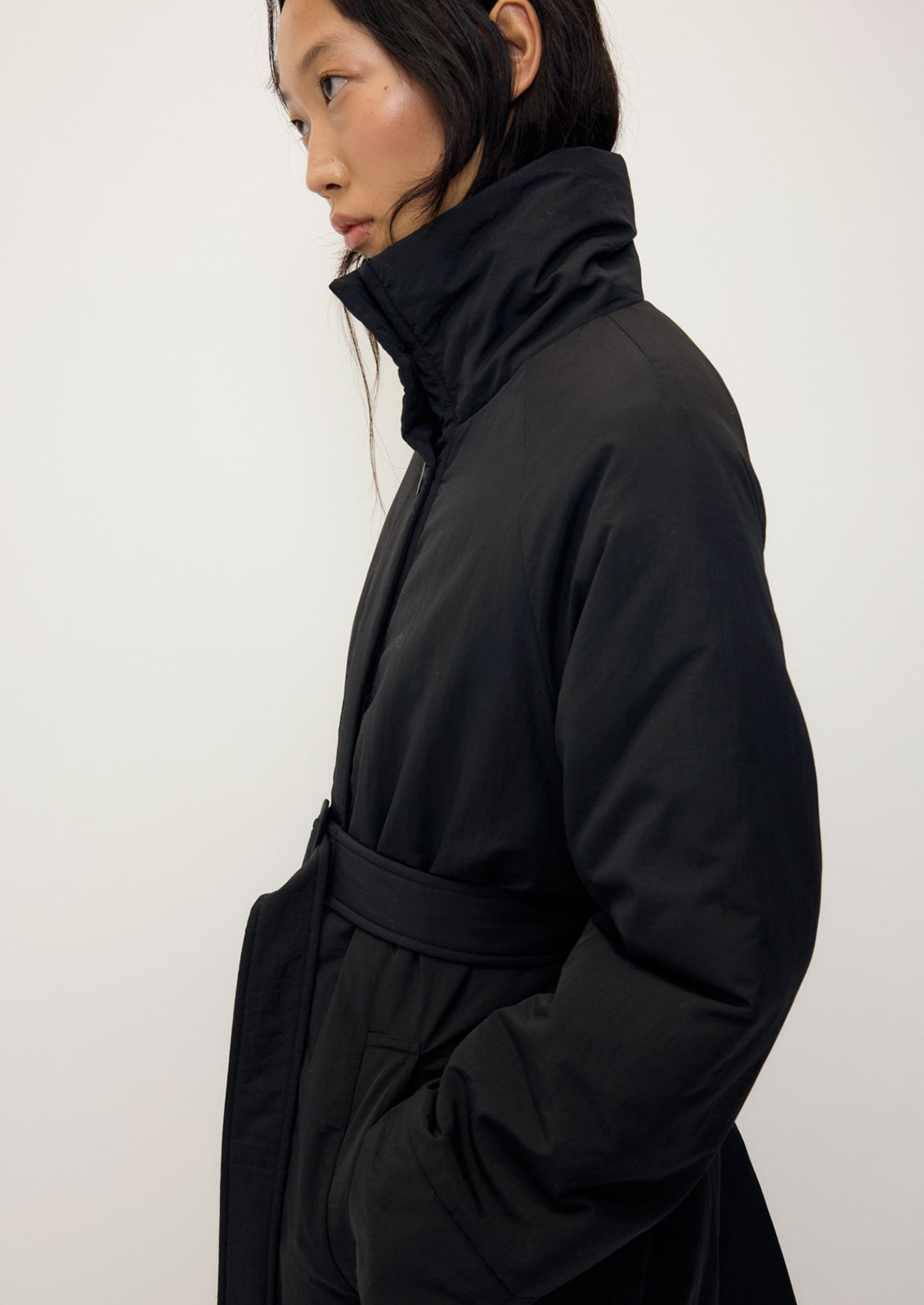 Tender Jacket in Black by Rita Row — side view showing the stand collar, sleeve and welt pocket