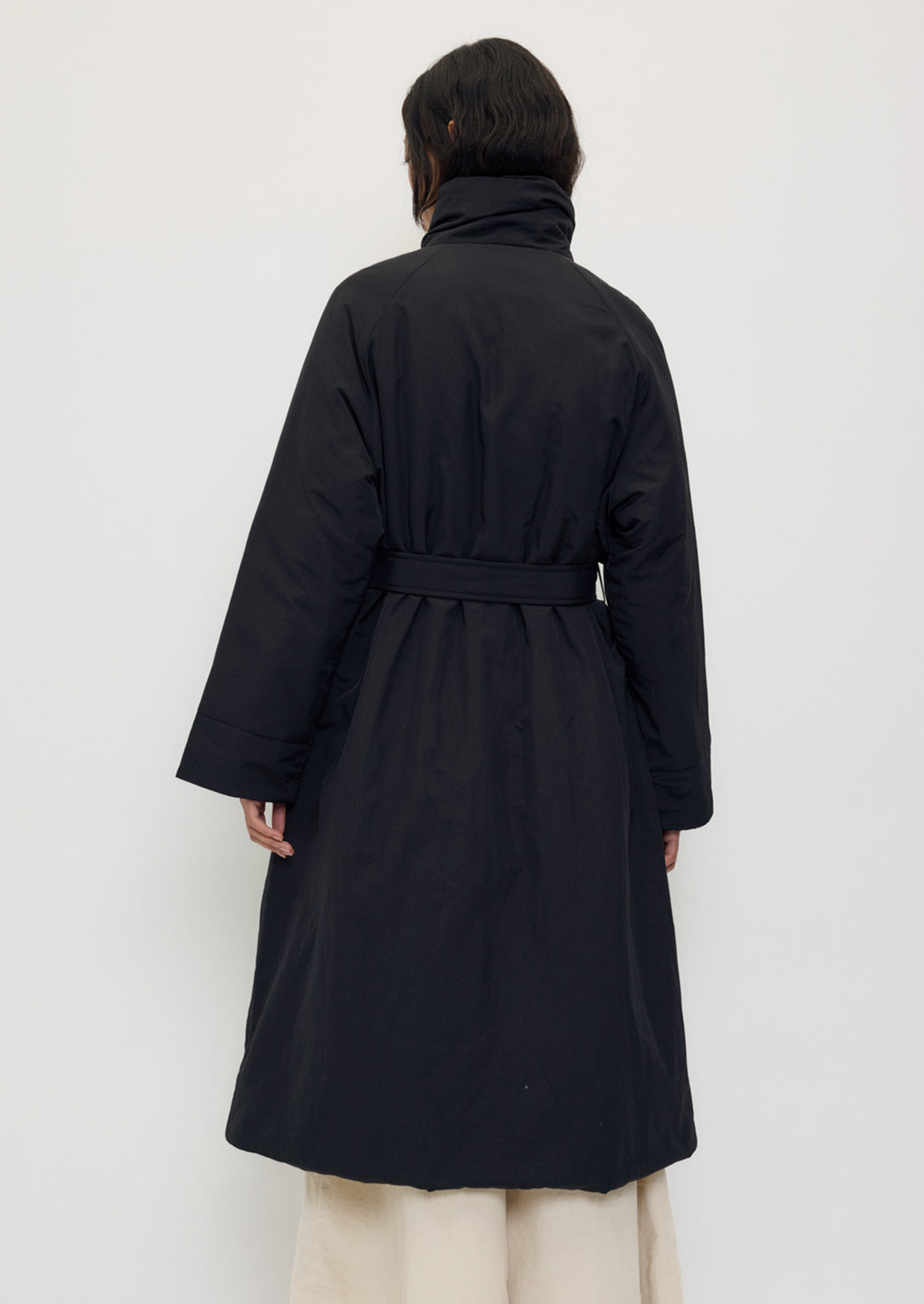 Tender Jacket in Black by Rita Row — back view showing the belt and the drop-shoulder cut