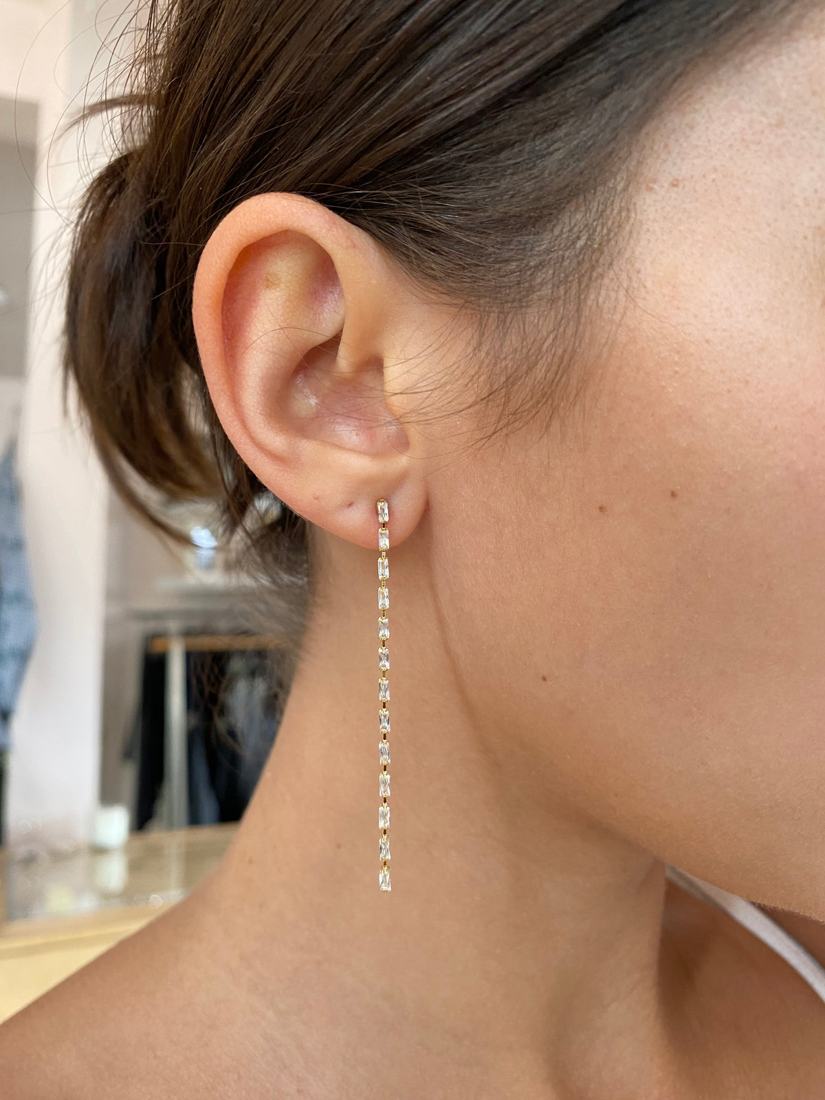 Baguette Crystal Chain Earrings by Dear Neighbor on the ear, drop length to the jaw
