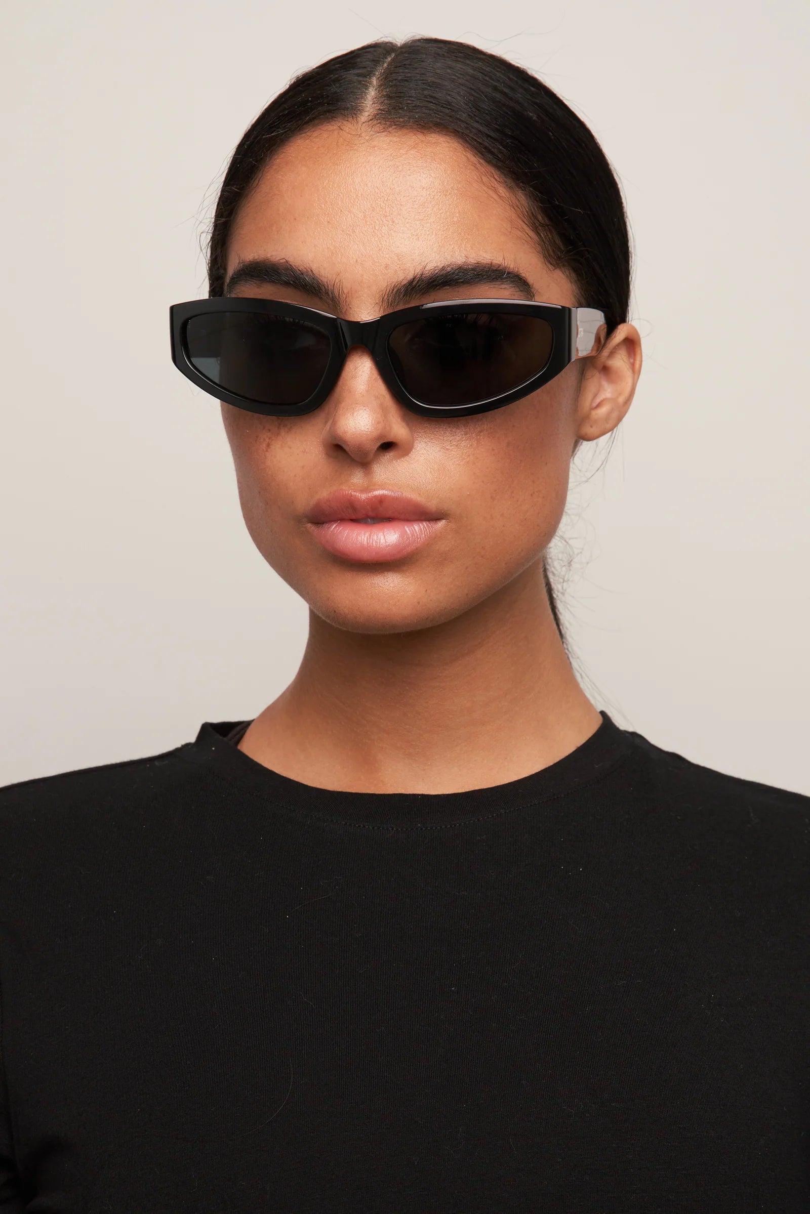 Raci Sunglasses in Black/Smoke