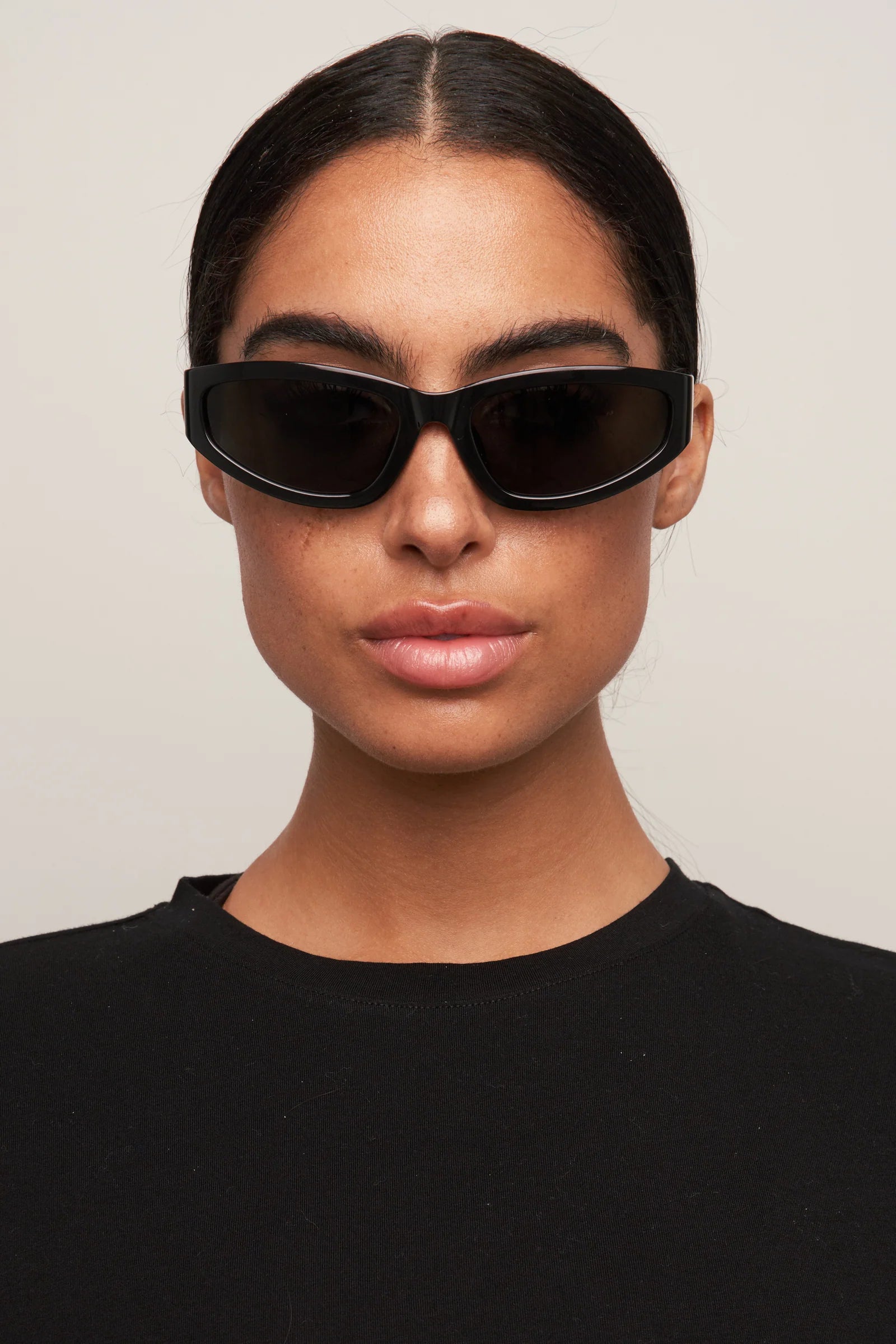 Raci Sunglasses in Black/Smoke