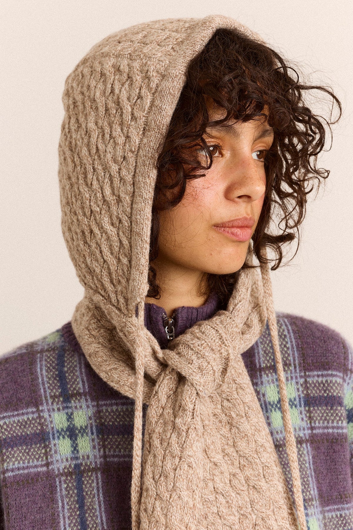 Hooded Pom Pom Scarf in Oatmeal Marl, close view of the cable knit hood