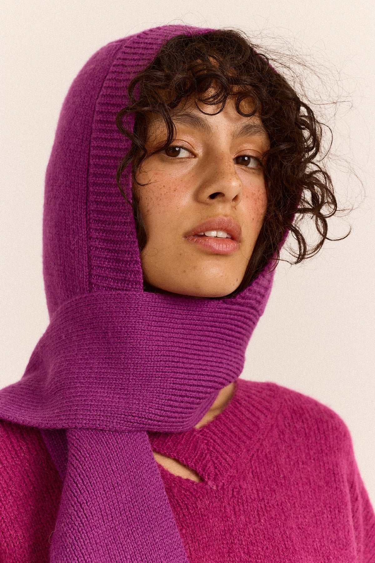 Tassel Hooded Scarf in Magenta, close view of the hood