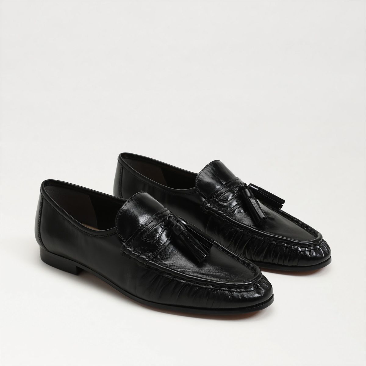 Lana Tassel Loafer in Black by Sam Edelman — both shoes, angled